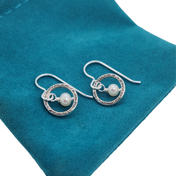 handmade earrings with white pearls and solid sterling silver